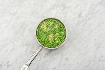 Kook de sperziebonen en gigli.