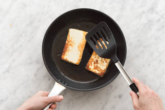 Cook Grilling Cheese