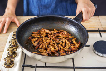 Stir-fry the strips
