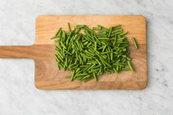 Couper les haricots verts