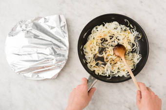 Cook onions and snap peas