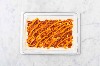 Enfourner la tarte fine