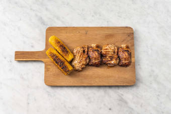 Grill chicken and corn