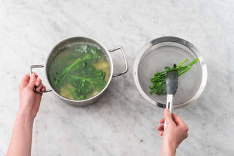 Cook potatoes and broccolini