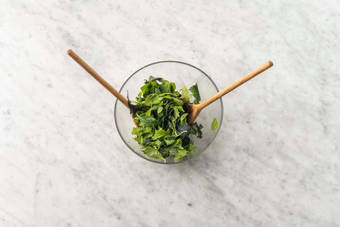 Toast buns and make vinaigrette