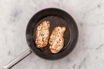 Season and sear chicken