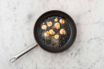 Cuire les Saint-Jacques