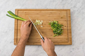 Slice green onions