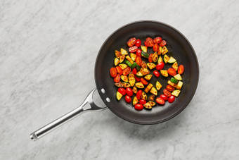 Cook Zucchini & Tomatoes