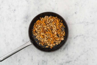 Cook pork and carrots