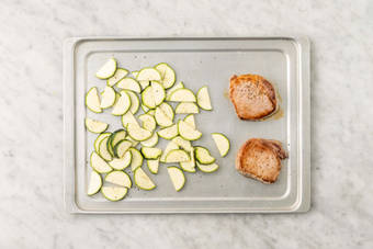 Cook pork and zucchini