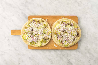 Enfourner les pizzas