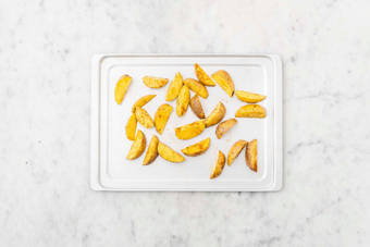 Roast potato wedges