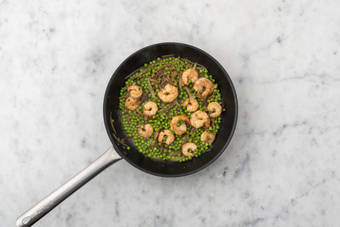 Add the Prawns and Peas