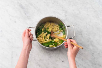 Cook creamy sauce and finish fusilli