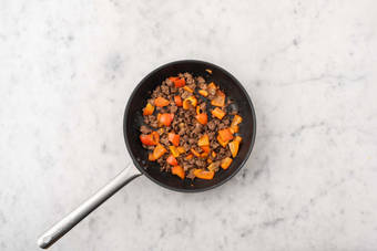 Cook beef and peppers