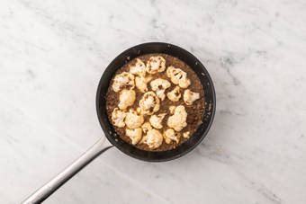 Cuocere cavolfiore e lenticchie