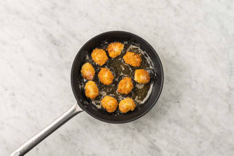 Nuggets en appel bakken
