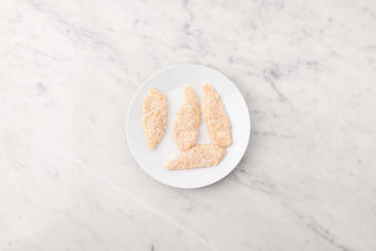 Kipfilethaasjes paneren