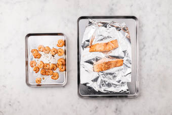 Broil salmon and shrimp