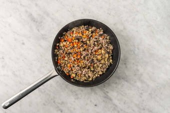 Cuire le poulet haché