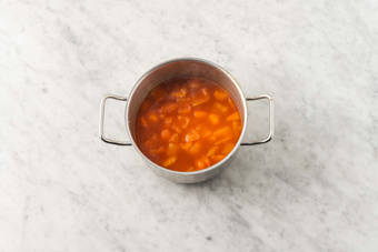 Eintopf köcheln lassen