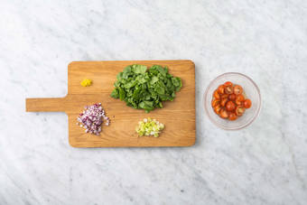 Prep and marinate tomatoes