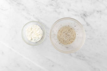 Make vinaigrette and tzatziki-feta spread
