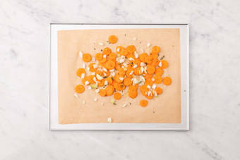 Prep and roast carrots and onions