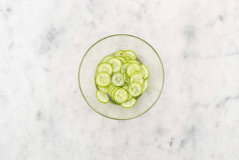 Prep and marinate cucumbers