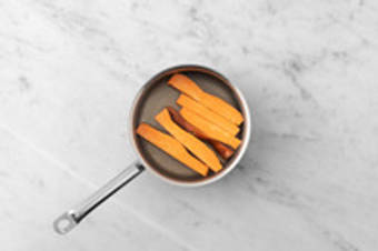 Parboil sweet potatoes