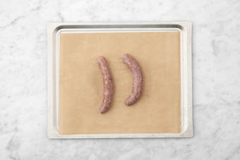 Enfourner les saucisses