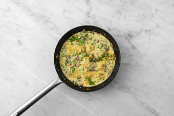 Cook and assemble ravioli