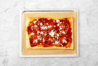 Enfourner la tarte fine