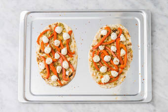 Assemble and toast pizzas