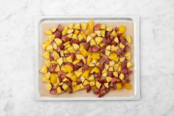 Prep and roast potatoes and peppers