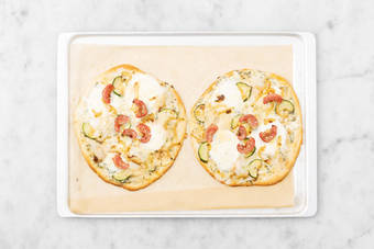 Enfourner les pizzas