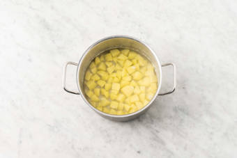 Prep and cook potatoes