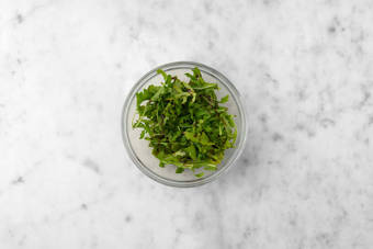 Condire la rucola