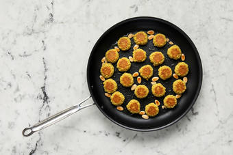 Cook falafel and almonds