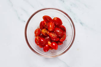 Prep and marinate tomatoes
