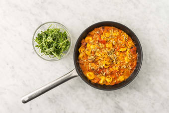 Gratinera tortelloni