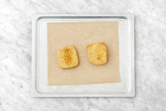 Make garlic bread 