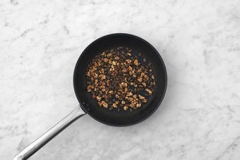 Toast walnuts and pepitas