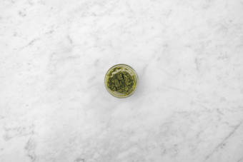 Season pesto and finish soup