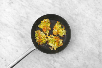 Cuocere le frittelle