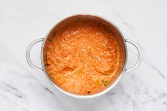 Simmer sauce and finish prep