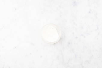 Lag hvitløksdressing