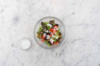 Make dressing and toss salad