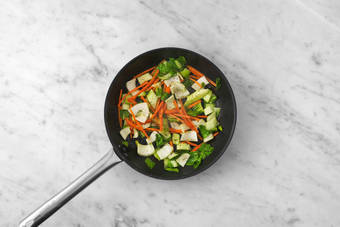 Cook veggies and noodles